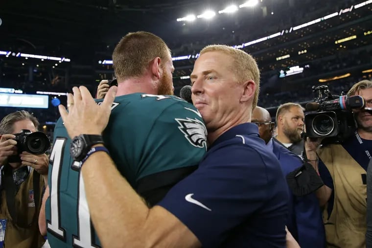 Jason Garrett hugs Carson Wentz after his Cowboys destroyed Wentz and the Eagles, 37-10.