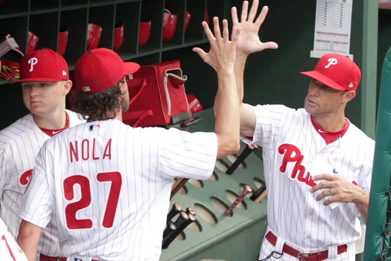 Gabe Kapler is keeping Aaron Nola (left) on the mound each fifth day.