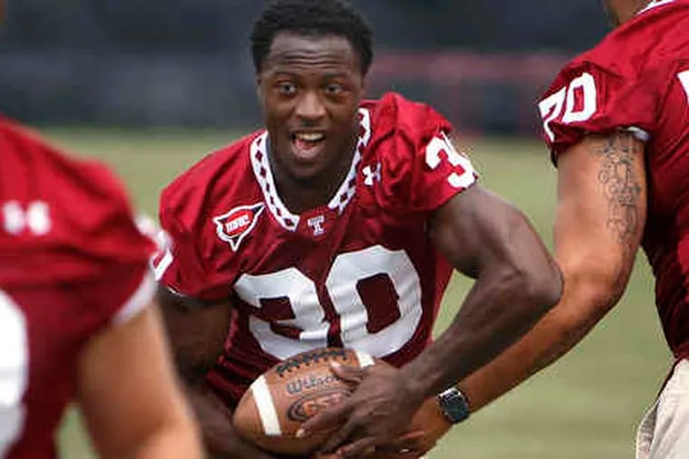 Temple's Bernard Pierce takes a handoff during practice on Thursday. He rushed for 1,361 yards and 16 TDs last season.