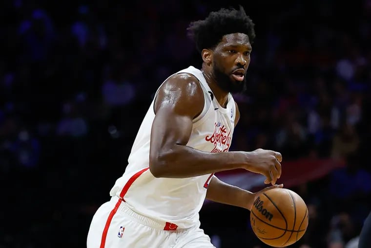 Sixers center Joel Embiid dribbles the ball against the Bulls on Monday.