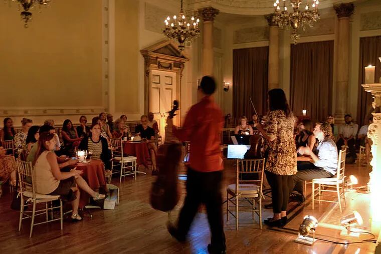 A chamber quintet sponsored by the local outreach organization Classical Revolution Philly prepares to perform September 9, 2015 at the Philopatrian Literary Institute's19th century mansion off Rittenhouse Square - the Stotesbury Mansion. ( TOM GRALISH / Staff Photographer )