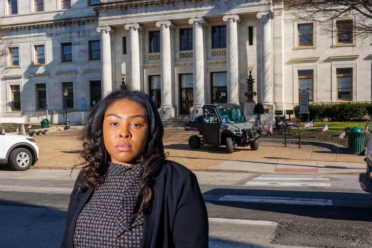 Lauren Footman, Delaware County's first diversity, equity, and inclusion director, was fired after she filed an EEOC complaint alleging racial discrimination by her boss, Marc Woolley, the county's deputy executive director. Here, she stands outside the Delaware County Courthouse and Government Center in Media, Pa.