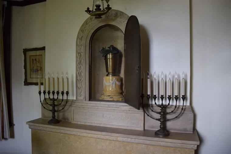 The urn contains the ashes of Delaware Valley University founder Joseph Krauskopf, who died in 1923. It rests in a room in the library that is a replica of Krauskopf's home office from his residence in Germantown.