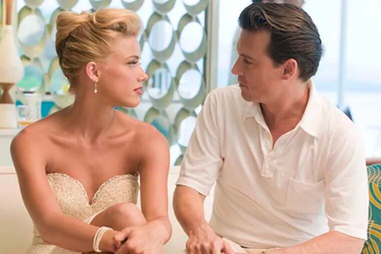 Amber Heard and Johnny Depp star in "The Rum Diary."
