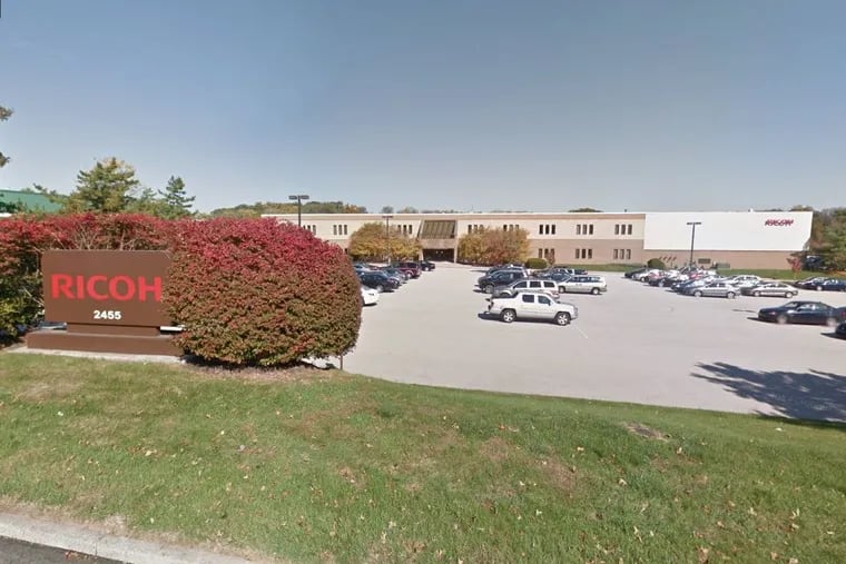 The Ricoh copier facility in West Norriton. Amazon’s subsidiary Woot! wants to open an on-demand T-shirt printing facility at the location but has experienced a delay in a Pennsylvania state air pollution review.