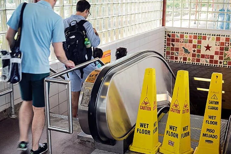 The escalator is out of service at the PATCO Ashland station Friday, August 16, 2013, as riders face more stair-climbing and handicapped passengers encounter more obstacles.  ( TOM GRALISH / Staff Photographer )