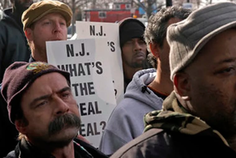 Union members rallied outside the DRPA headquarters in Camden in 2005 to support dredging the Delaware River. Debate over the issue between politicians in Pennsylvania (for) and New Jersey (against) has been going on for 15 months.