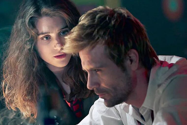 Matt Ryan as John Constantine and Lucy Griffiths as Liv in the series' first episode. (NBC)