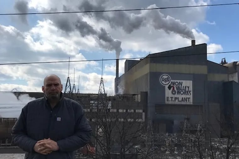 Lt. Gov. John Fetterman pictured outside his house across the street from U.S. Steel's Edgar Thomson Works facility in Braddock, Pa., on Feb. 28.