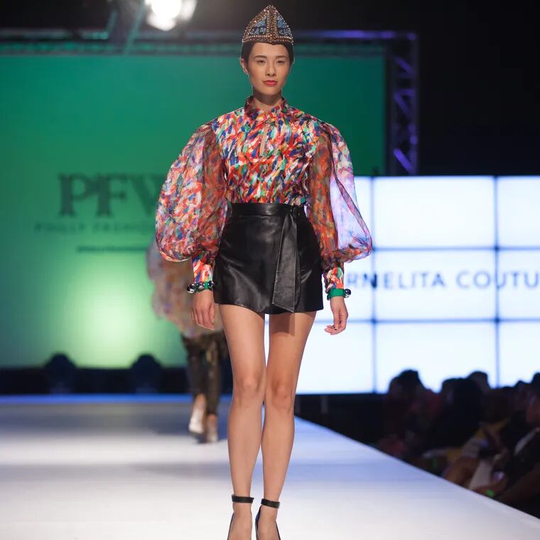 Celebrate all things fashion and design at Philadelphia’s very own Fashion Week Feb. 21 to 25. Model wears a leather skirt and floral blouse from local designer Carmelita Couture on a past Philly Fashion Week runway.