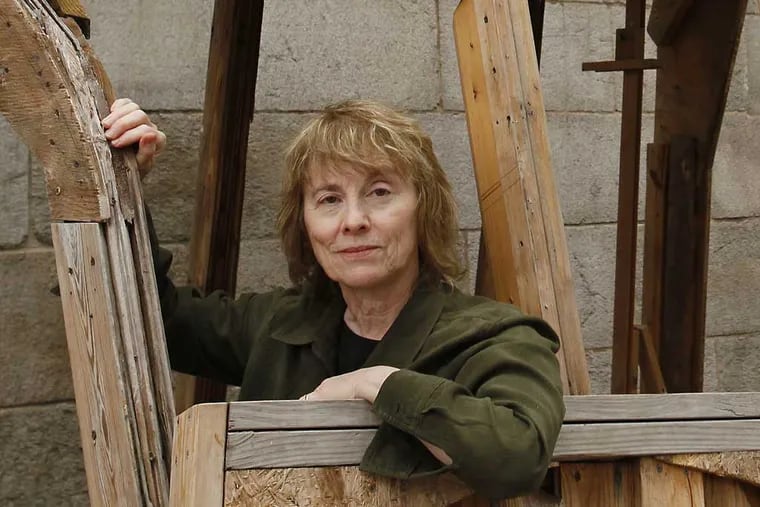 Camille Paglia stands in an art installation outside The University of the Arts. Her new book is “Glittering Images: A Journey Through Art From Egypt to Star Wars."  (  Michael S. Wirtz / Staff Photographer ) October 9 2012.