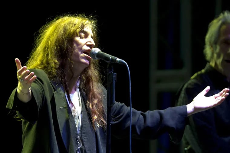Patti Smith performing during a May concert in Mexico City. She visits with her daughter to sing and read poetry in celebration of Walt Whitman's 200th birthday.