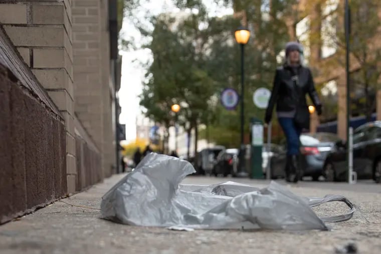 A plastic bag lays on the ground in Center City.