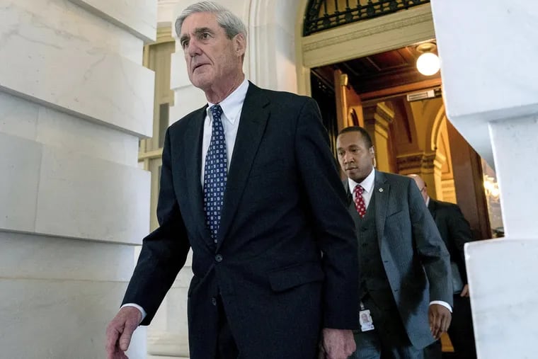 In this June 21, 2017, file photo, former FBI Director Robert Mueller, the special counsel probing Russian interference in the 2016 election, departs Capitol Hill following a closed door meeting in Washington.  On Monday, George Conway published an article arguing in favor of Mueller's appointment.