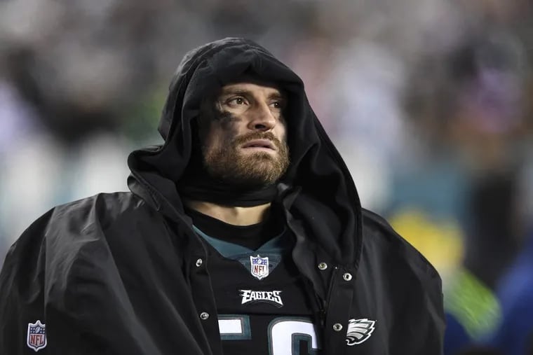 Eagles defensive end Chris Long, bundled up on the sideline during the game against the Raiders on Monday night.