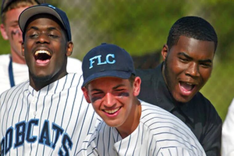 Lenny Nicoletti (center) celebrates with Franklin Learning Center teammates after win.