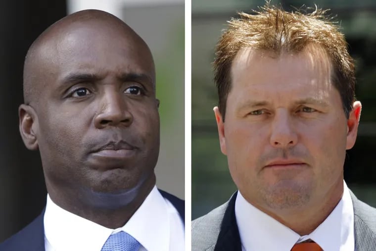 At left, in a June 23, 2011, file photo, former San Francisco Giants baseball player Barry Bonds leaves federal court in San Francisco. At right, in a July 14, 2011 file photo, former Major League baseball pitcher Roger Clemens leaves federal court in Washington. Tim Raines and Jeff Bagwell are likely to be voted into baseball’s Hall of Fame. Bonds and Clemens have previously been shunned from the Hall of Fame because of allegations of steroids use/