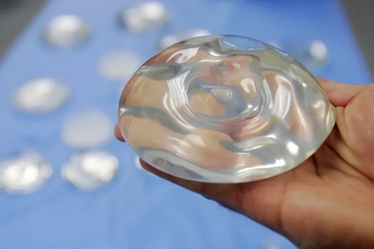 The FDA says it will convene a public meeting of medical advisors next year to discuss the latest science on the safety of breast implants.