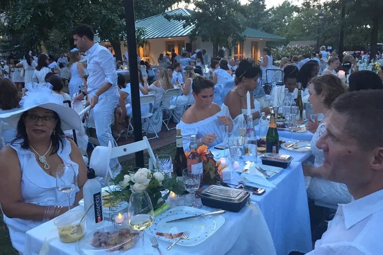 Stormy Lundy of South Philly and her Diner En Blanc group at the 2017 event.