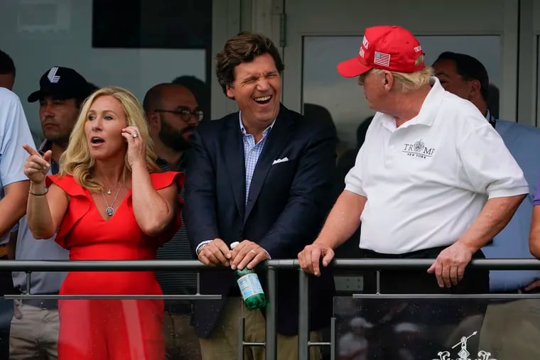 U.S. Rep. Marjorie Taylor Greene (left), Fox News host Tucker Carlson (center), and former President Donald Trump are frequent peddlers of misinformation and conspiracy theories.