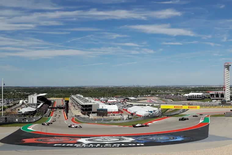 FILE - In this Oct. 21, 2018, file photo, drivers round a turn the opening lap out of turn one during the Formula One U.S. Grand Prix auto race at the Circuit of the Americas in Austin, Texas. After years of hosting the top European racing series, the Circuit of the Americas is finally racing IndyCar. The U.S.-based series runs the first IndyCar Classic in Austin, Texas this week with a special bonus of $100,000 if the driver who qualifies in pole position also wins the race.