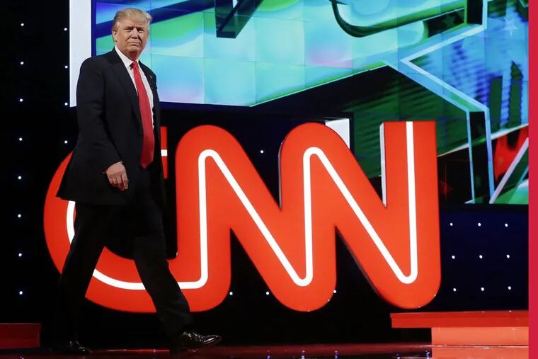 Happier Times: Then Republican-candidate Trump walks out on stage at a debate hosted by CNN.