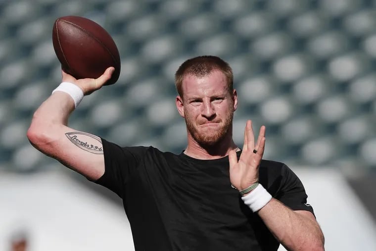 Eagles quarterback Carson Wentz throws the football during warm-ups before the Eagles played a preseason game against the New York Jets on Thursday, August 30, 2018. YONG KIM / Staff Photographer