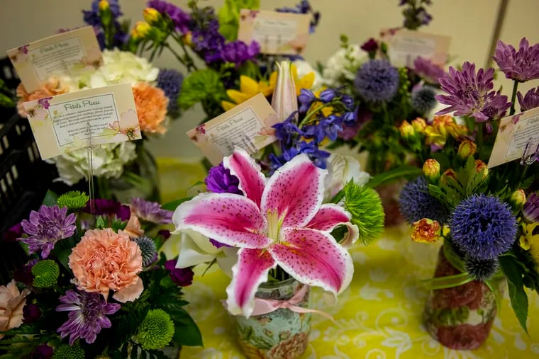 A table filled with finished bouquets made by Petals Please volunteers at Downingtown United Methodist Church.