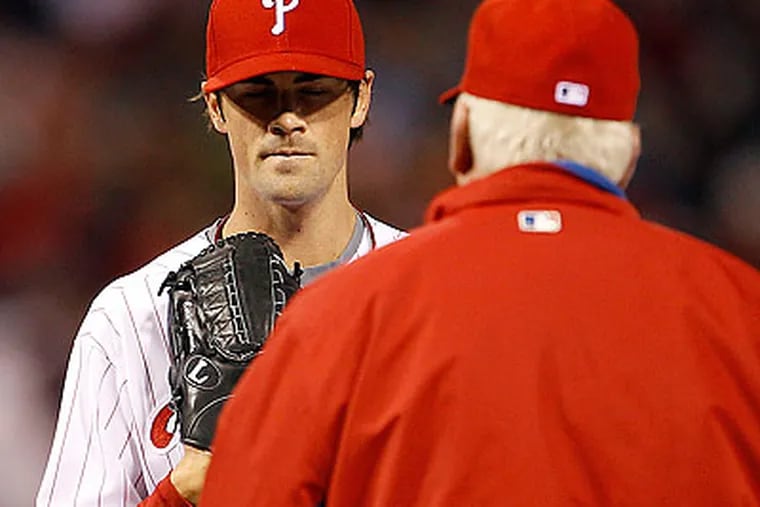 Cole Hamels was booed by Phillies fans after giving up six runs in one inning to the Mets. (Yong Kim/Staff Photographer)