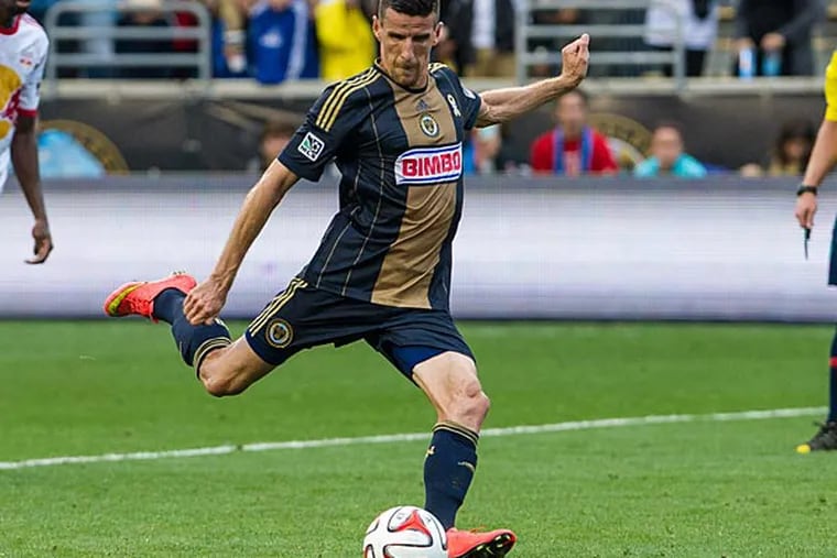 Philadelphia Union forward Sebastien Le Toux (11) takes a penalty kick and scores to tie the match against the New York Red Bulls during the second half at PPL Park. The match ended in a 2-2 draw. (John Geliebter/USA Today)
