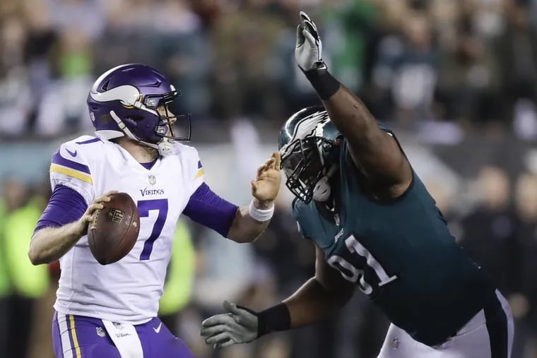 Eagles defensive tackle Fletcher Cox goes after Minnesota Vikings quarterback Case Keenum in the NFC Championship game on Sunday, January 21, 2018 in Philadelphia. YONG KIM / Staff Photographer