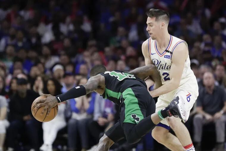 T.J. McConnell defends Boston Celtics guard Terry Rozier during Game 3 on Saturday.