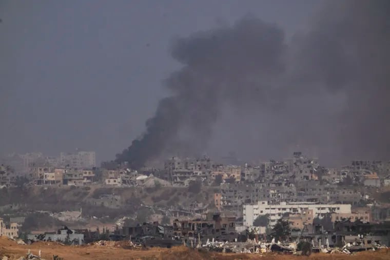 Smoke rises to the sky after an explosion in the Gaza Strip on Tuesday, May 21, 2024.