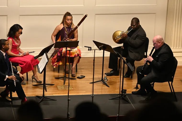 Imani Winds (from left) Brandon Patrick George, Toyin Spellman-Diaz, Monica Ellis, Jeff Scott and Mark Dover -- performing Friday night at the American Philosophical Society for the Philadelphia Chamber Music Society.