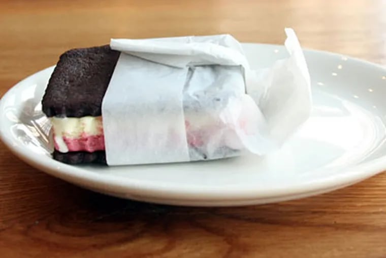 Erin O'Shea made sandwiches with vanilla and cherry ice cream. (JONATHAN YU / Staff Photographer)