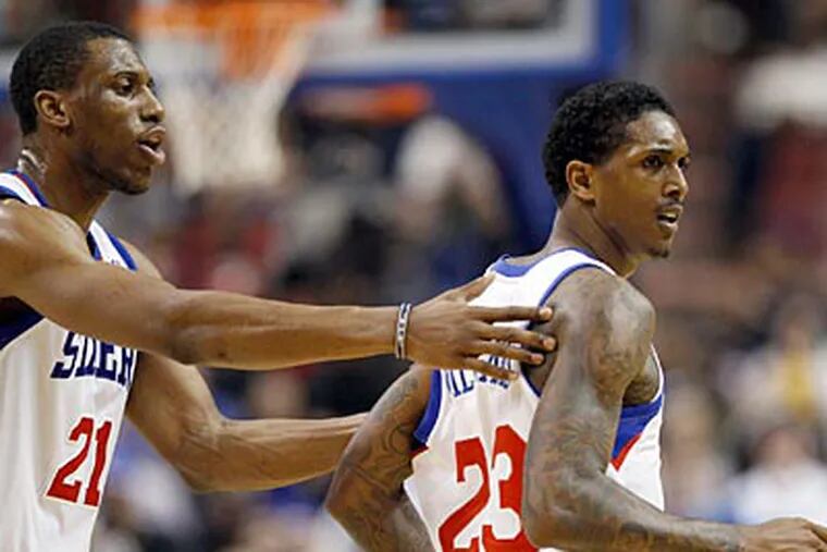 Thad Young, Lou Williams and a young 76ers squad are hurt by the lack of practice time. (Yong Kim/Staff Photographer)