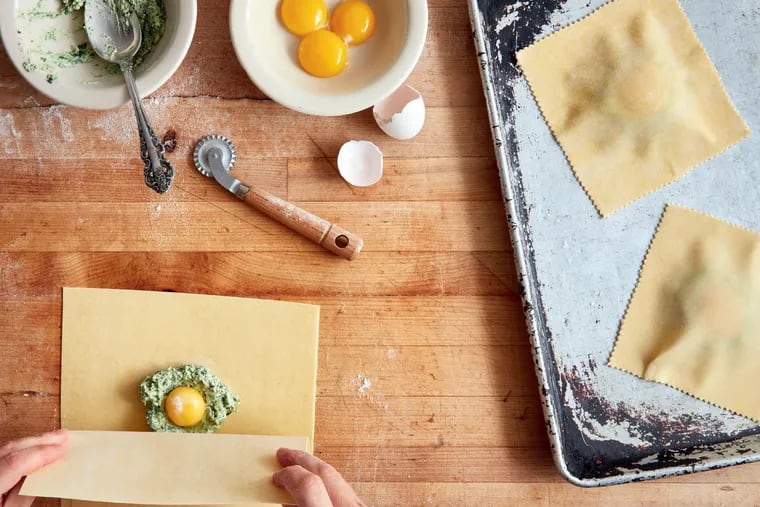 Giant raviolo di Vasto, from 'Dinner at the Club,' has a hidden egg yolk inside that melts into brown sage butter when you cut into it, creating a delectable rich sauce.