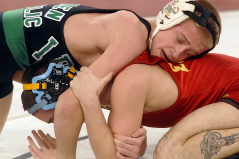 Taylor Walsh (top), a Camden Catholic junior, was the state runner-up at 119 pounds. He will wrestle at 130 this season.