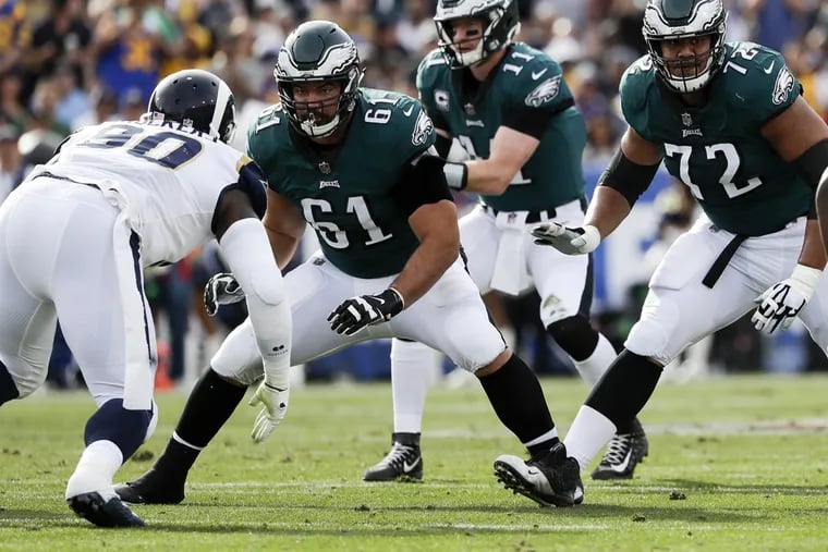 Eagles guard Stefen Wisniewski (61), getting ready to block against the Rams.