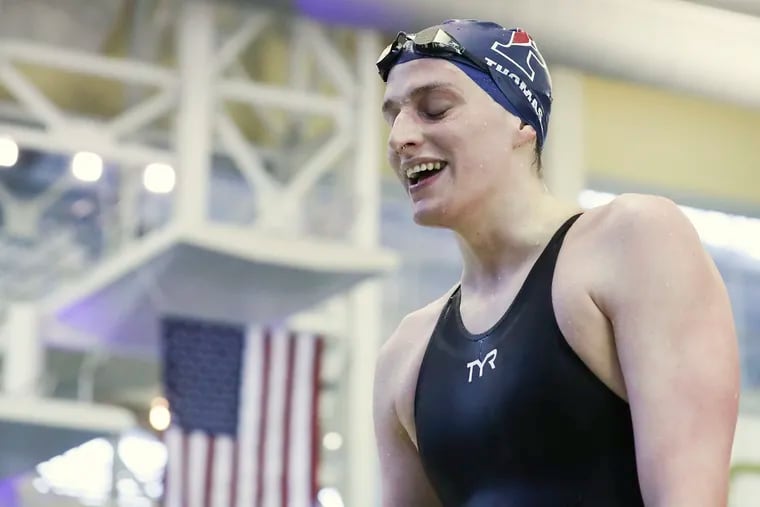 Penn swimmer Lia Thomas smiles after finishing first in the 500 freestyle race during the NCAA women's swimming and diving championships on Thursday. Thomas is the first transgender athlete to win a Division I national title.