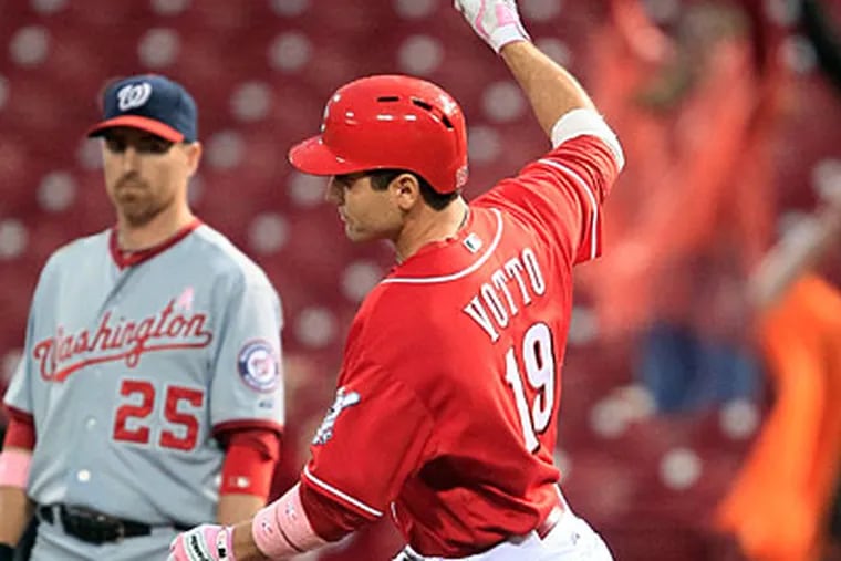 Reds first baseman Joey Votto hit two solo homers and a grand slam against the Nationals. (Al Behrman/AP Photo)