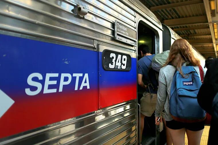 A SEPTA Trenton Line train pulls onto track four at 30th Street Station. A panel appointed by President Obama sided with SEPTA management Monday on most of the issues in its long-running labor dispute with Regional Rail engineers and electrical workers.