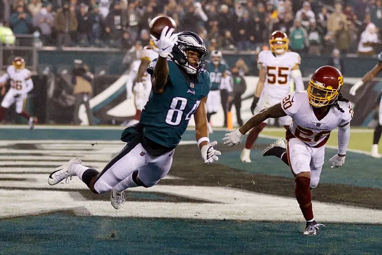 Philadelphia Eagles wide receiver Greg Ward (84) tries to catch a third quarter pass against Washington Football Team cornerback Bobby McCain (20) Tuesday, December 21, 2021 at Lincoln Financial Field in Philadelphia, Pa.
