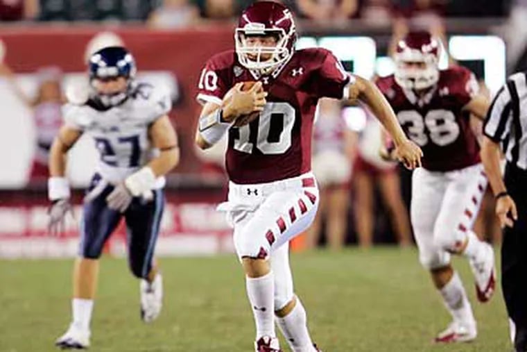 Temple quarterback Chris Coyer is averaging 8.6 yards per carry and hasn't thrown an interception. (AP Photo / Tom Mihalek)