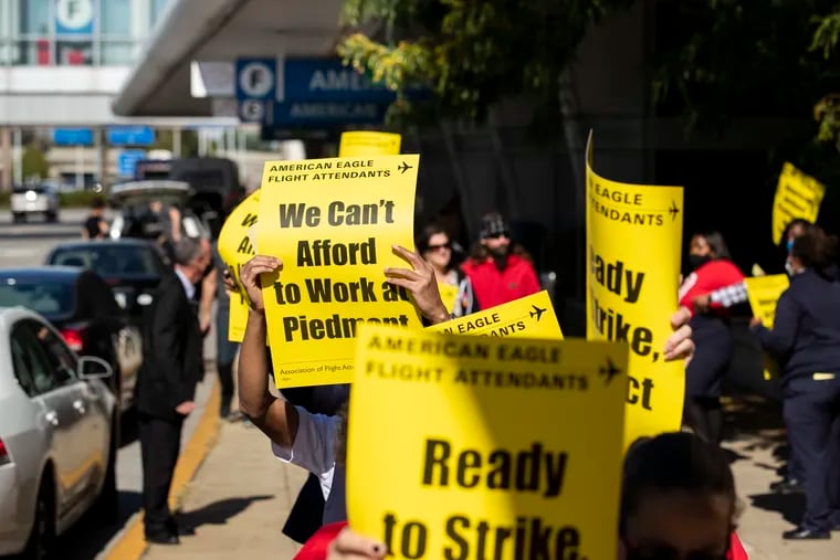 Union members from the Association of Flight Attendants-CWA Local 61 and supporters picketed outside of Terminal F at Philadelphia International Airport in Philadelphia, Pa. on October 21, 2021.