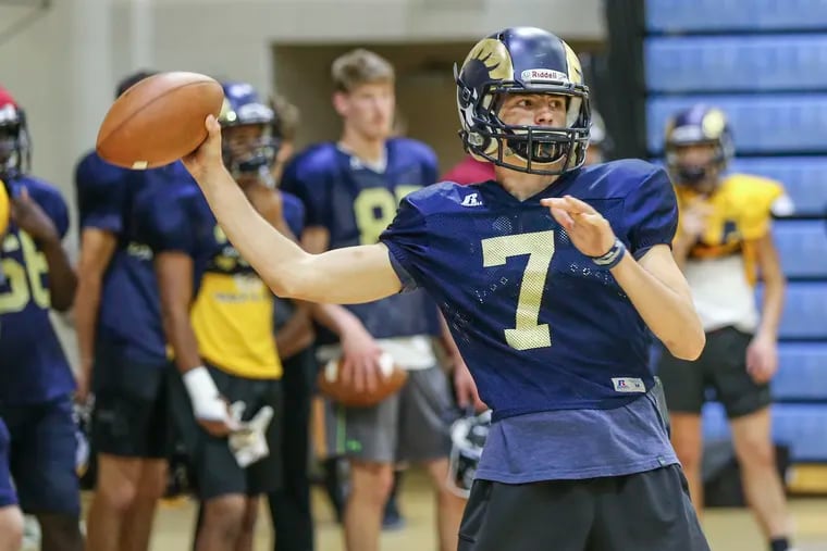 Spring Ford quarterback Ryan Engro at indoor practice on Thursday.