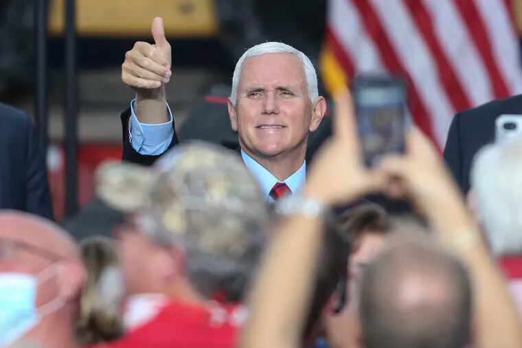 Vice President Mike Pence leaves the stage after holding a "Workers for Trump" campaign event in Exeter Pa., Tuesday, September 1, 2020
