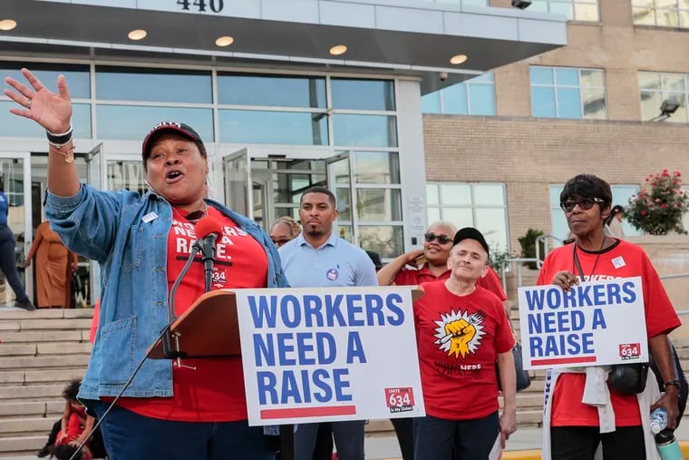 Nicole Hunt, Local 634 president, speaks to Philadelphia School District cafeteria and climate workers at a Sept. 21 rally. The union, which represents 1,900 members, inked a tentative contract late Thursday night.