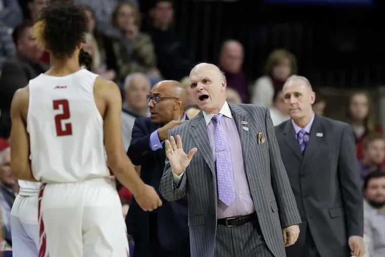Saint Joseph's Head Coach Phil Martelli looks toward forward Charlie Brown Jr., during a first-half timeout against Penn at The Palestra on Saturday, January 26, 2019.