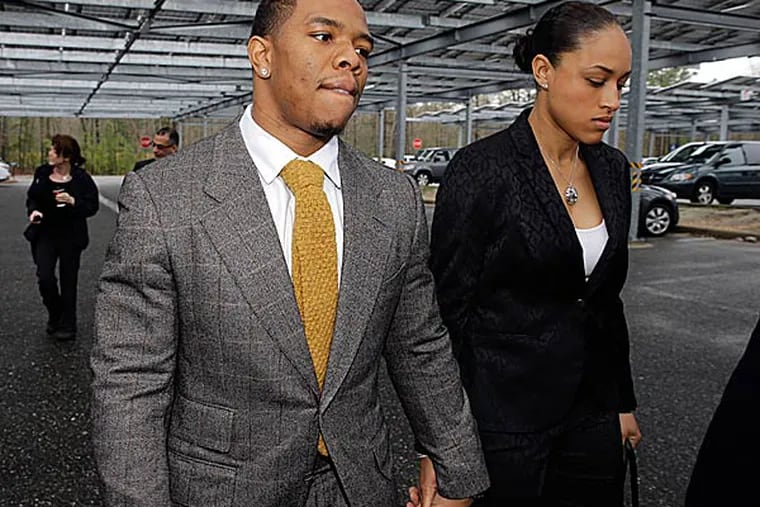 Running back Ray Rice with his wife Janay Palmer. (Mel Evans/AP)